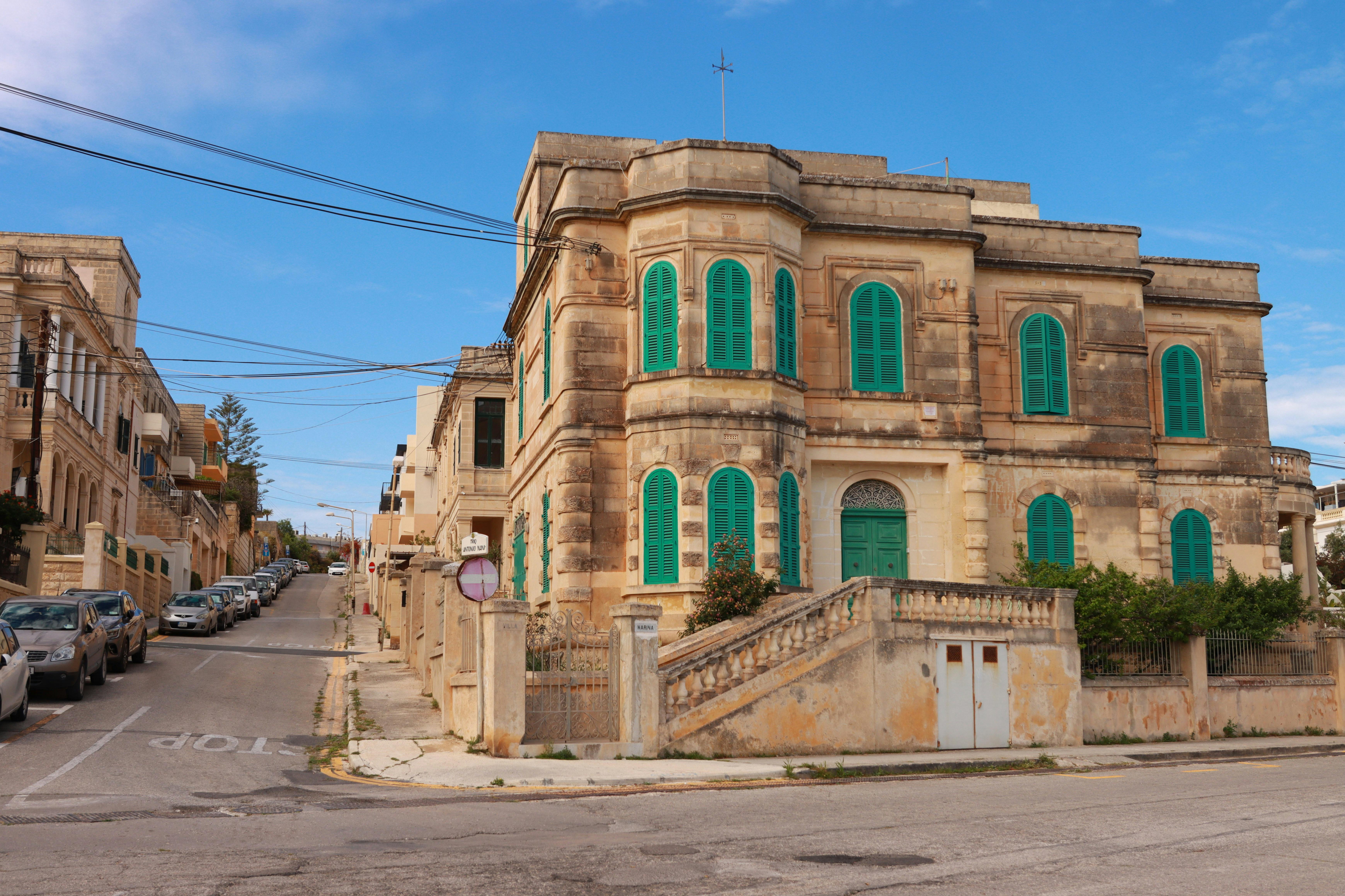 Boutique language school with green shutters in St Julian's